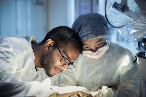 Photograph of a doctor and nurse performing a surgical procedure at Mayo Clinic, Jacksonville 